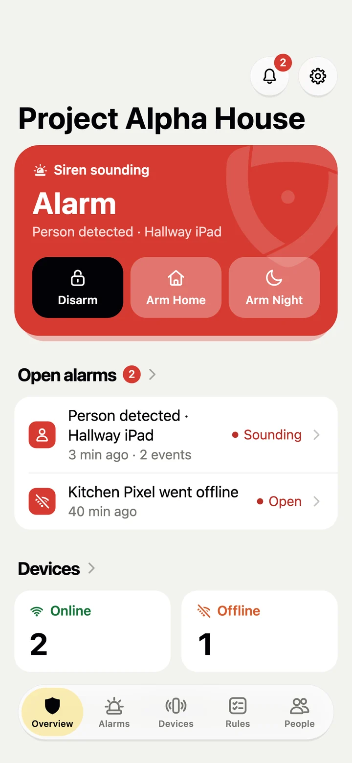 Alarm screen: the status card is red with Siren sounding, Person detected by Hallway iPad, and a Disarm button.